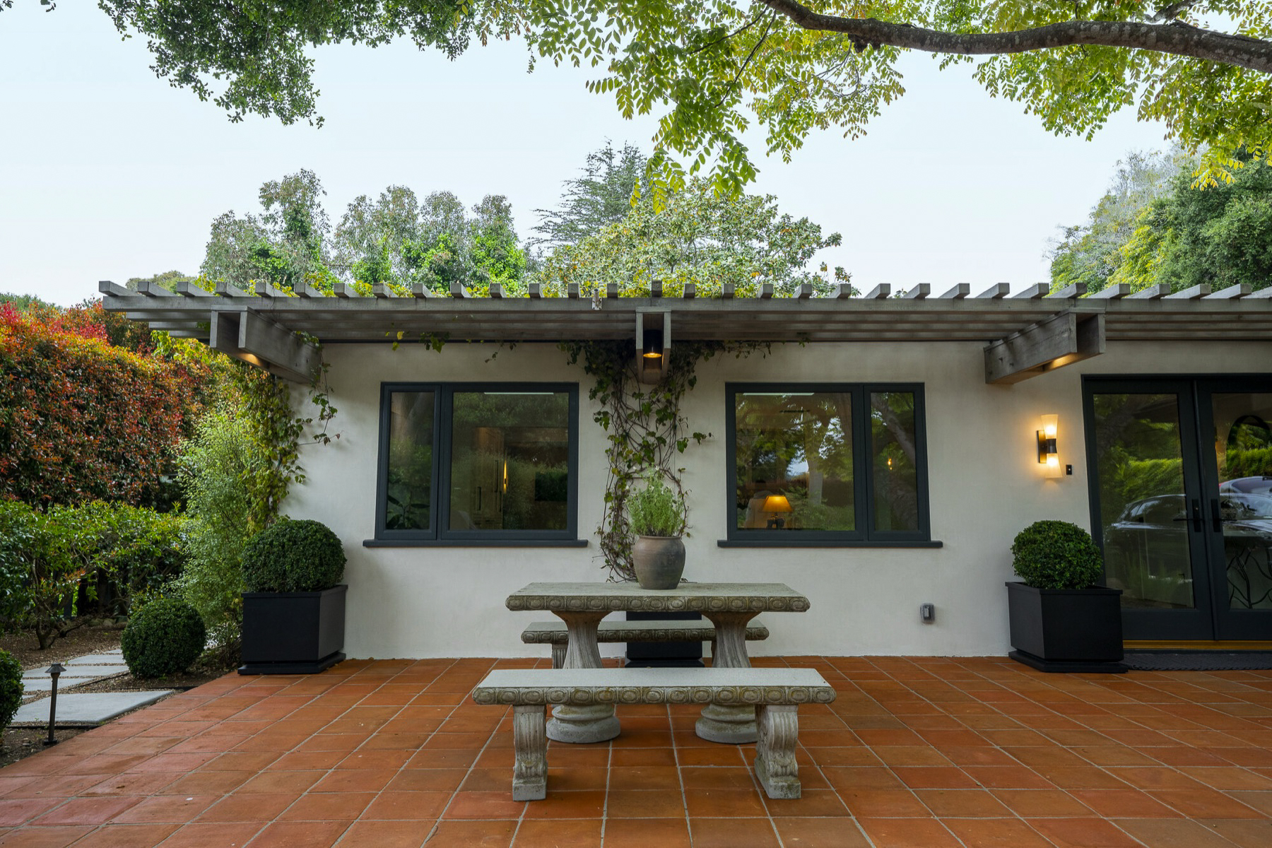 Pergola and stone table